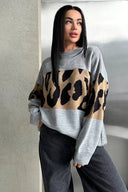 Maglione a blocchi di colore con stampa leopardata retrò