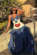 Top bustier con motivo astratto di volto e collo halter